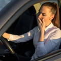tired_female_driving_to_second_job