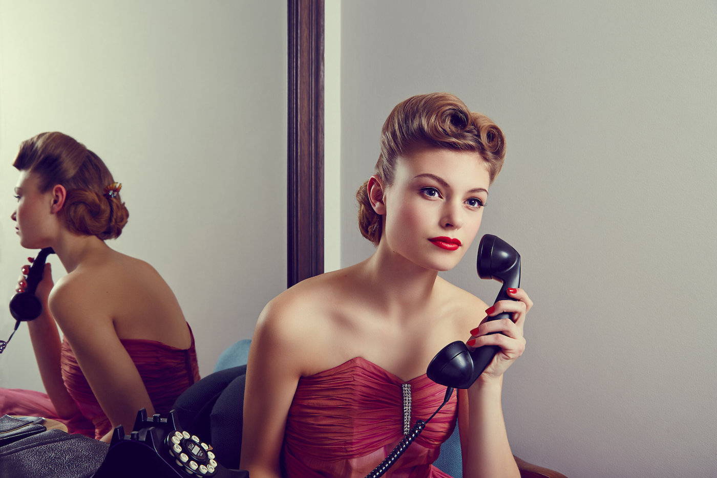 Image from the book Timeless: A Century of Iconic Looks. Photo by Denisa Ilie. Model wears 1950s prom dress and red lipstick