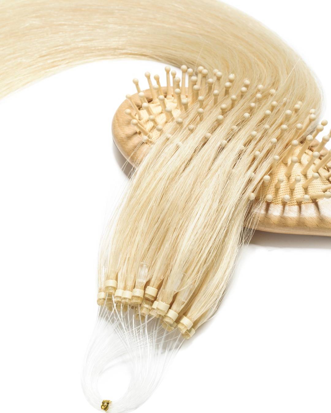 Brushing Medusa blonde micro ring hair extensions  