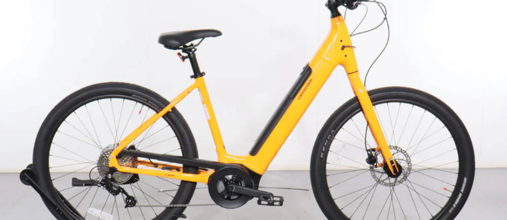 a yellow Cannondale Adventure Neo 4 electric commuter bike