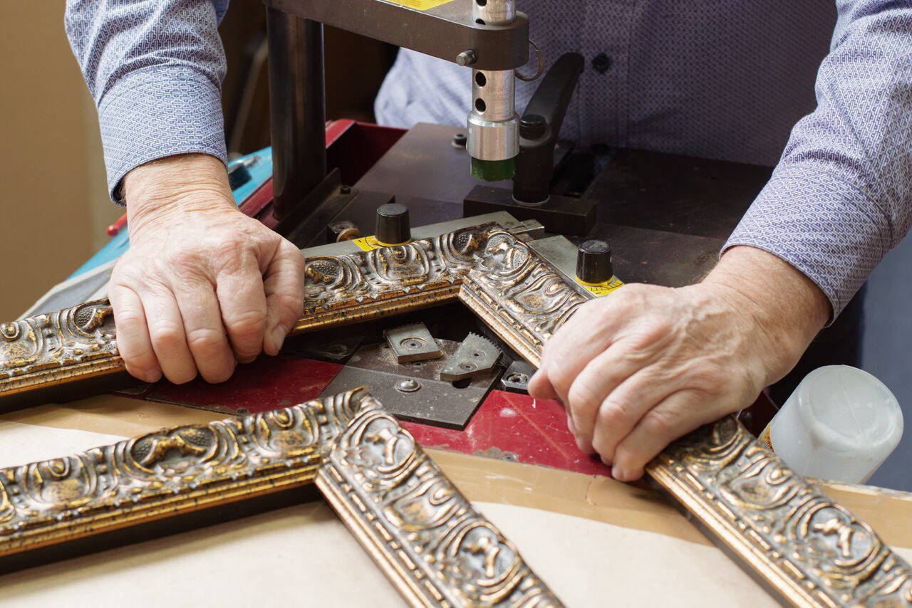 Joining an ornate frame in the workshop