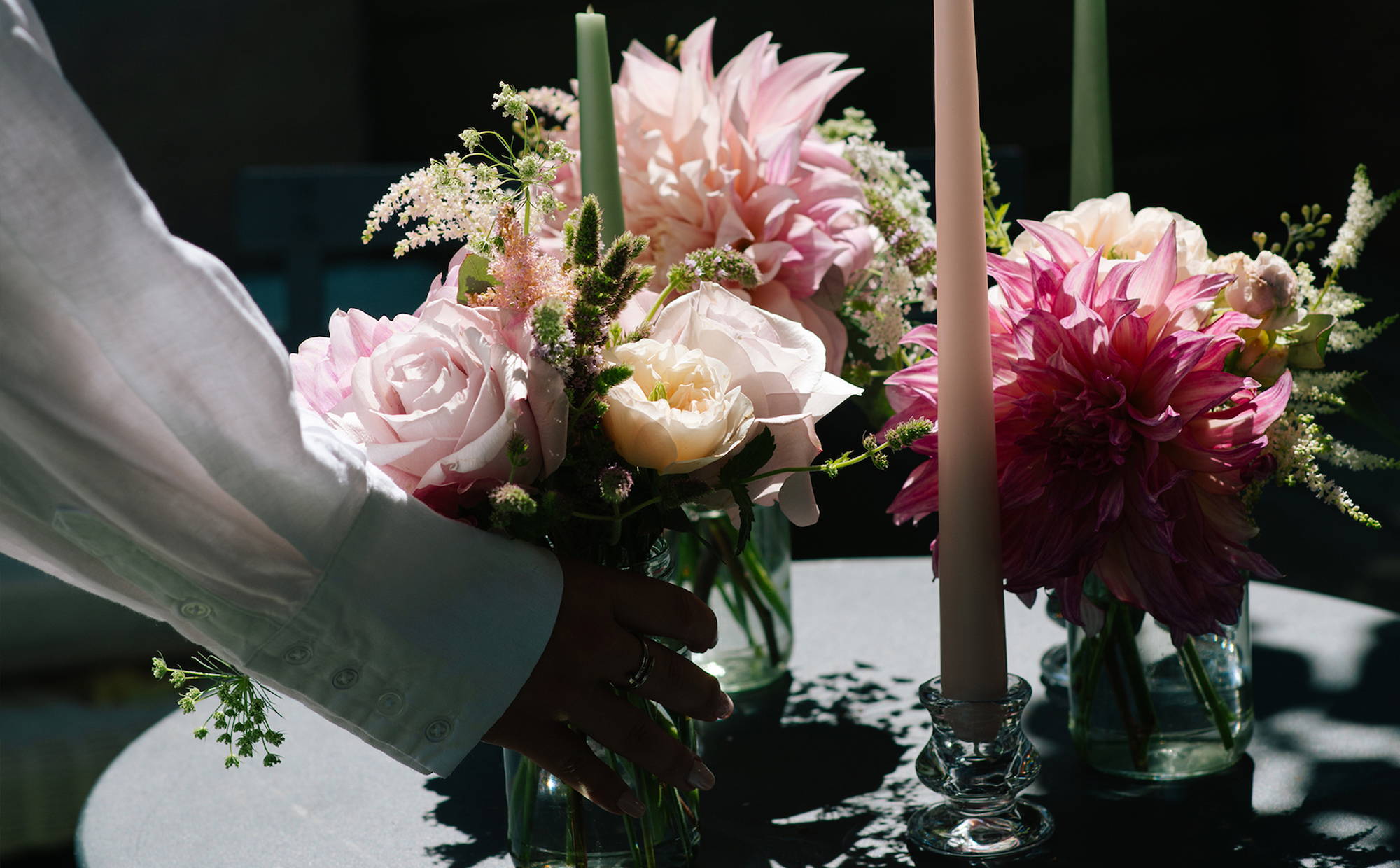 Wild at Heart Summer Jam Jar Tablescape Set, featuring small posy bouquets with four tapered candles. 