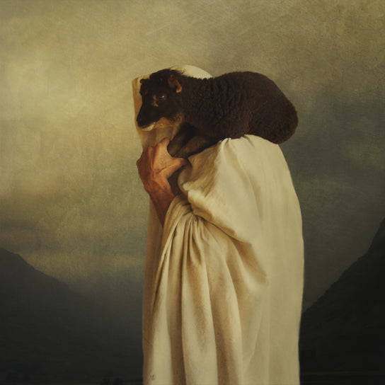 Jesus carrying a black sheep on His shoulders.