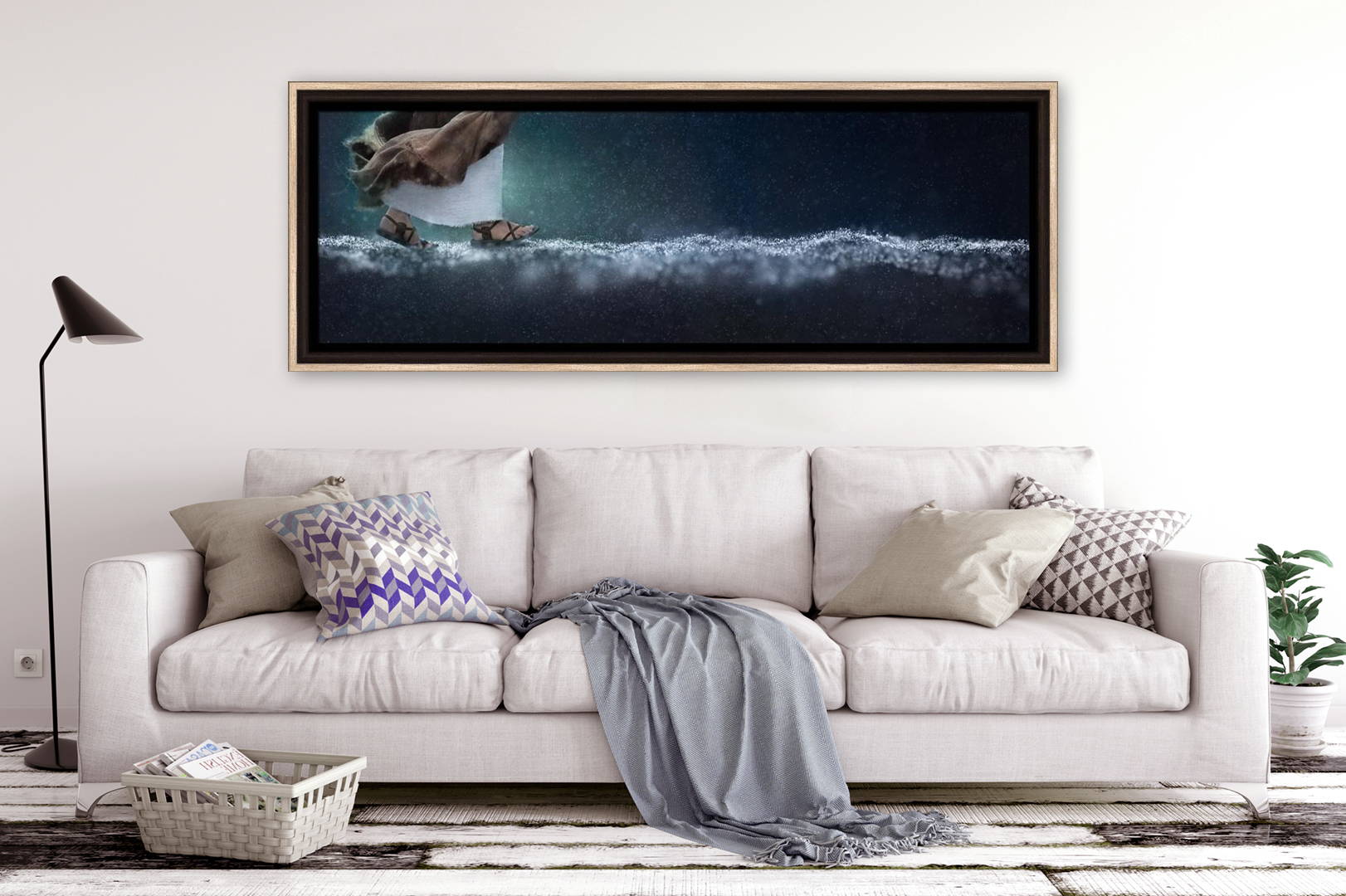 Panormaic picture of Jesus walking on water hanging above a sofa.