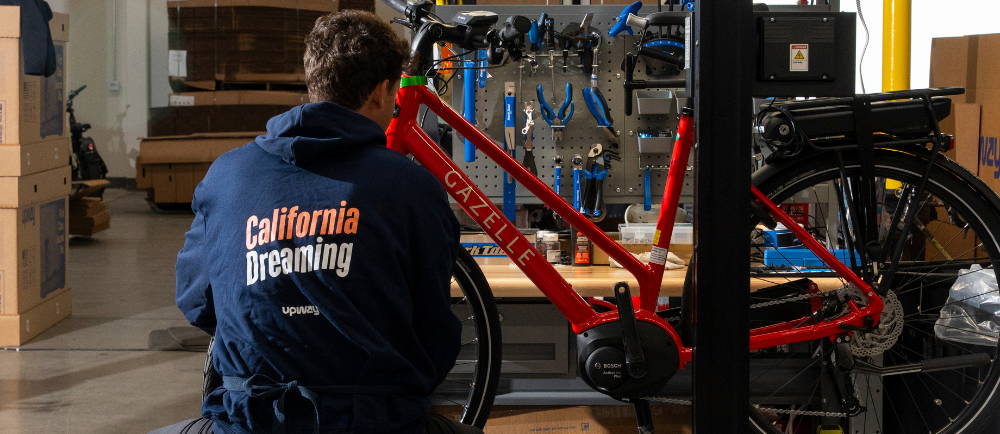 Upway Los Angeles mechanic fixing Gazelle ebike