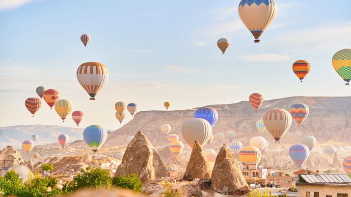 Witnessing the mass ascension of numerous balloons simultaneously is a common and awe-inspiring sight, creating a magical atmosphere over the Cappadocian skies