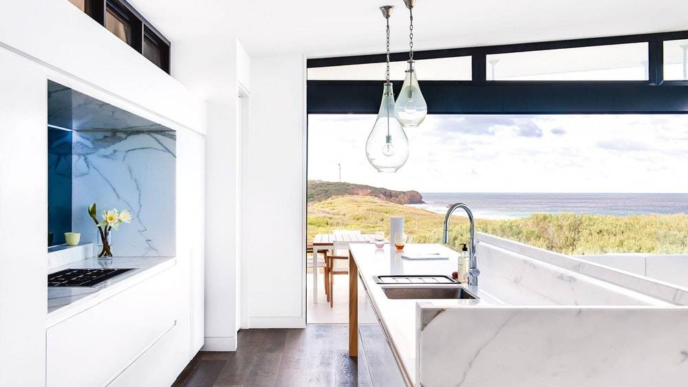 White laminated laminate benchtops in a kitchen