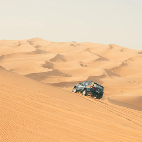 From Dubai: Lehbab desert Safari w/ Camel riding & Sandboarding