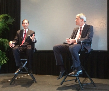 Paul Reilly[r. with Bill Van Law] fielded questions from an audience concerned about the regulatory environment and possible threats to the independence of advisors.