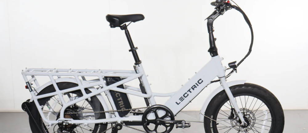 a white Lectric XPedition electric cargo bike