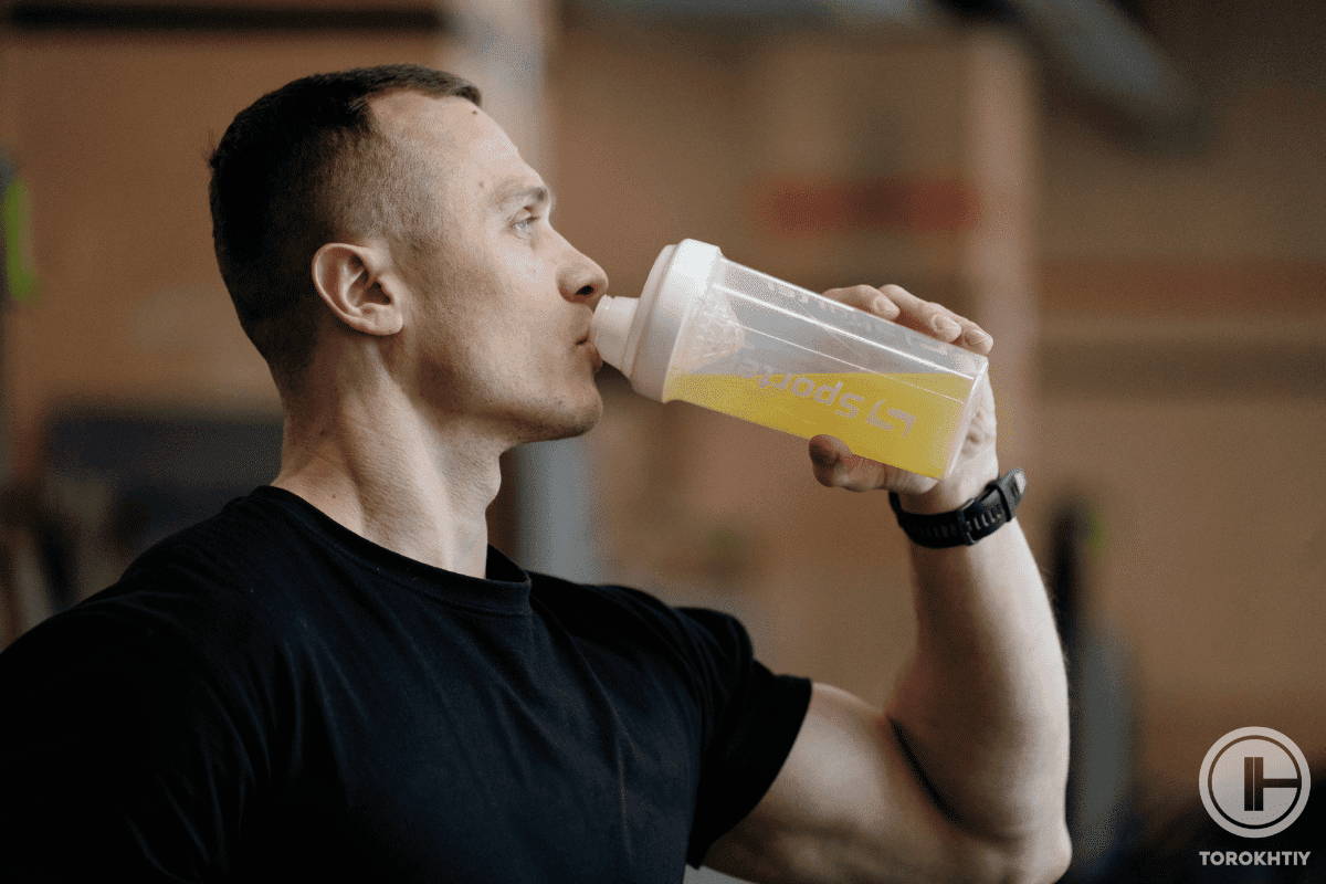 Athlete Drinking Protein Shake