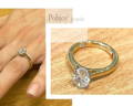 Oval diamond bespoke ring with twin birthstonesPobjoy Diamonds