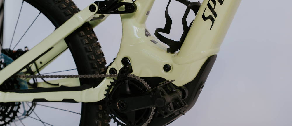 a white Turbo levo full suspension electric mountain bike