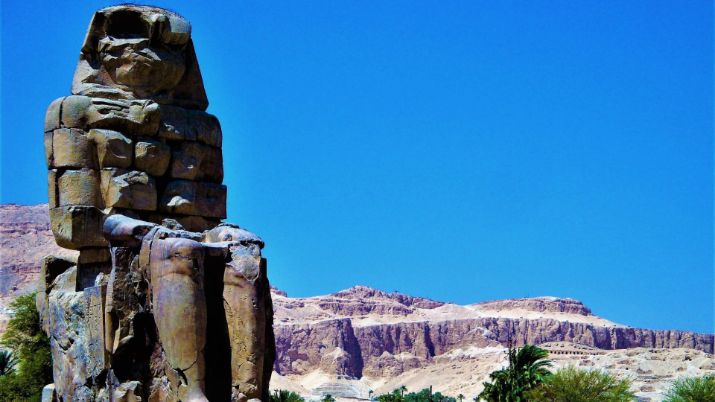 A close up view of one of the two statues of the Colossi of Memnon