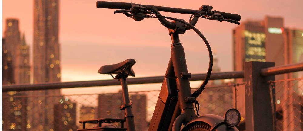 a step through electric bike at sunset in new york city