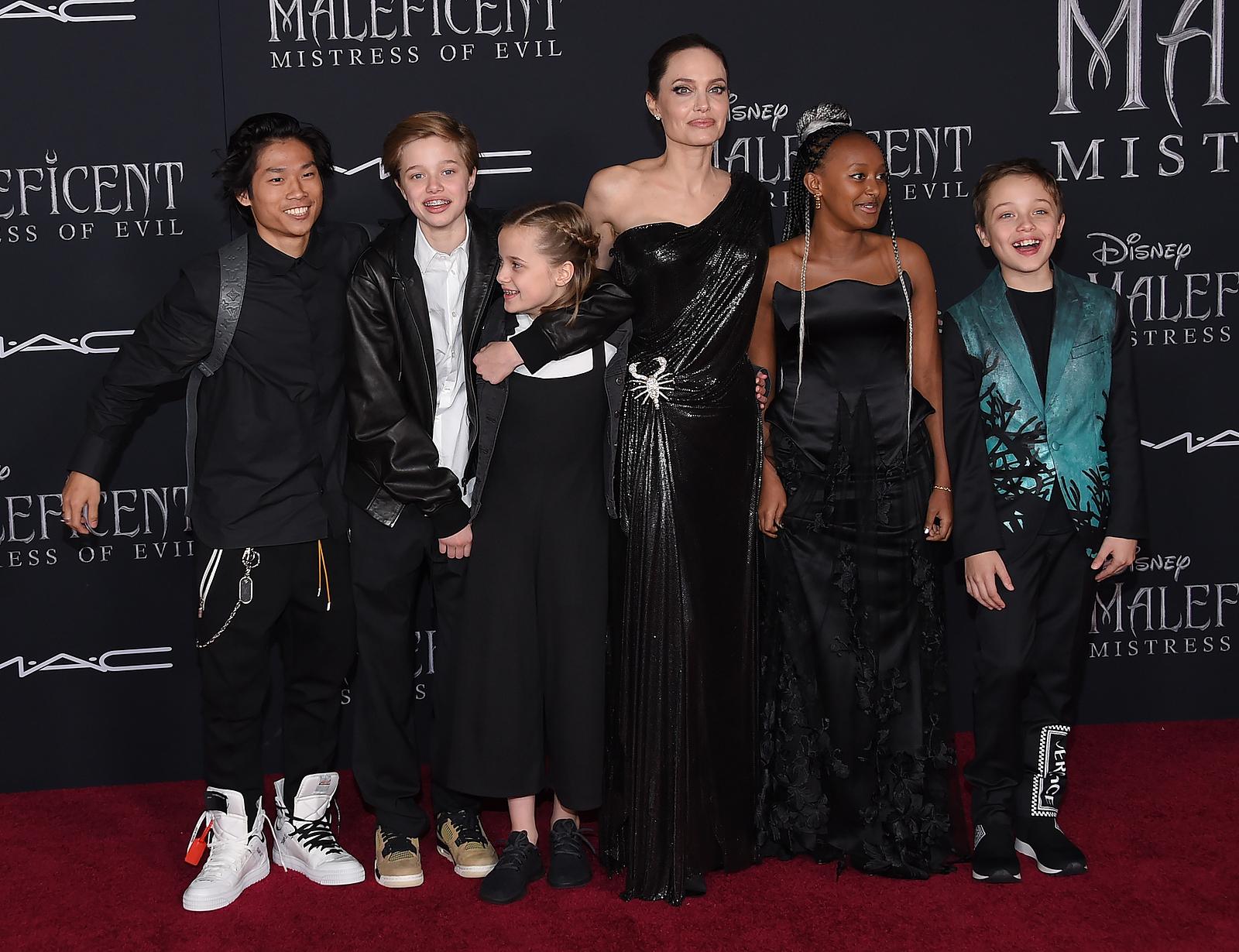 Image of Angelina Jolie at at the Malificent  world Premier with her children starting with Pax, Shiloh, angelina, Vivienn.
