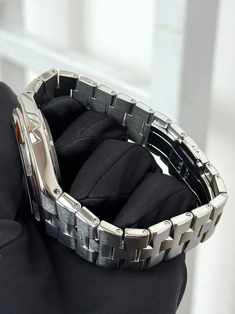 Leather strap included