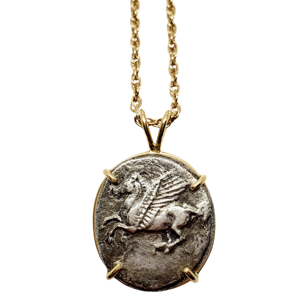 Ancient Pegasus silver coin from Corinth.  Set in 18kt gold.