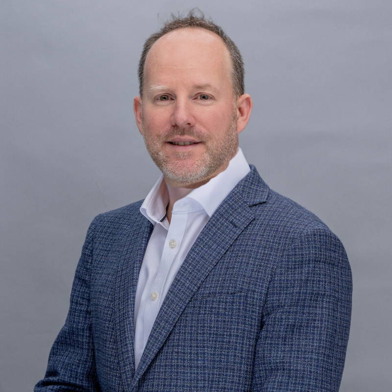 a man in a suit and tie