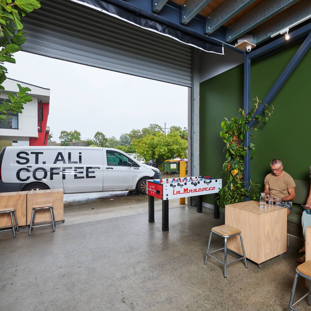 ST. ALi Brisbane cafe interior with van outside