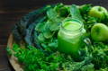 a variety of green leafy vegetables and other green foods