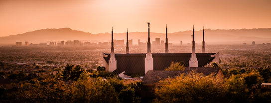 Panoramic photo of the Las Vegas Temple rising above the city.