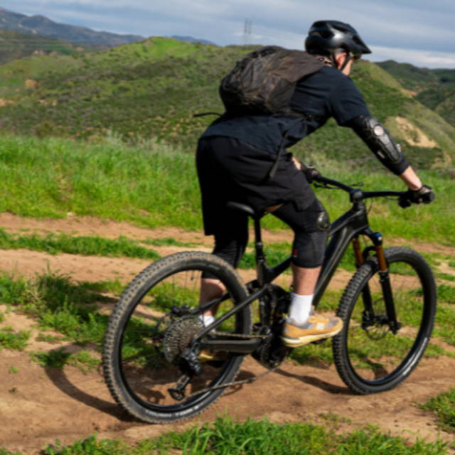 a man riding an electric mountain bike