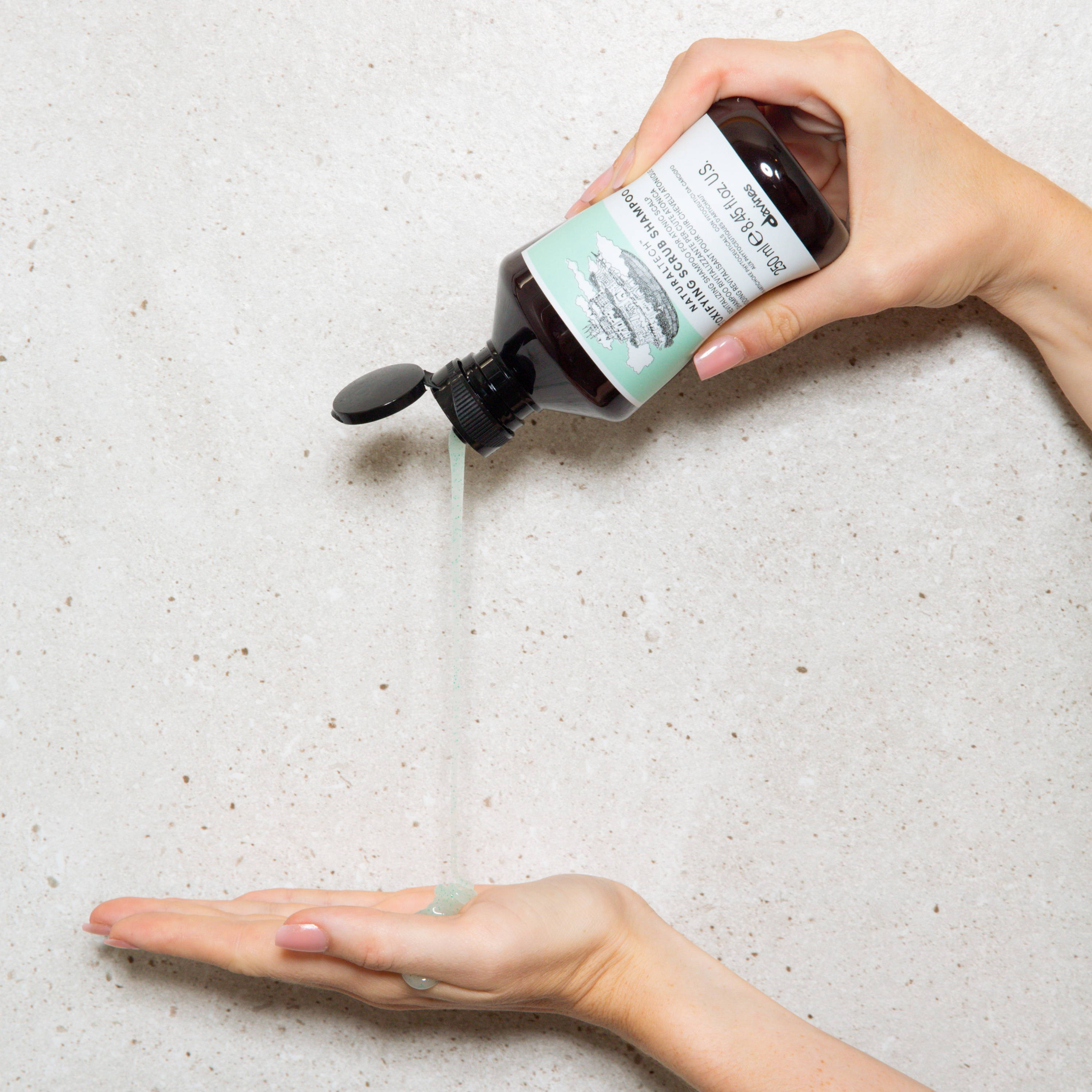 back of model with long, red hair