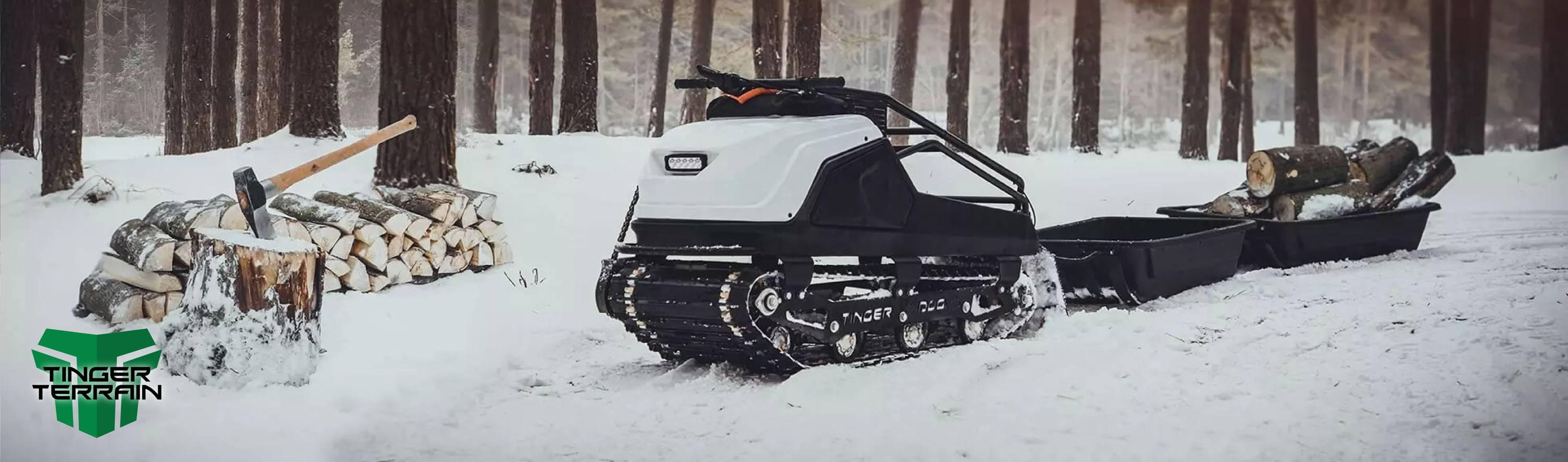Tinger Dog in the Snow hauling logs and splitting fire wood with a axe
