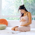 Haven mattress Adjustable Frame for pregnancy, pregnant woman in bed