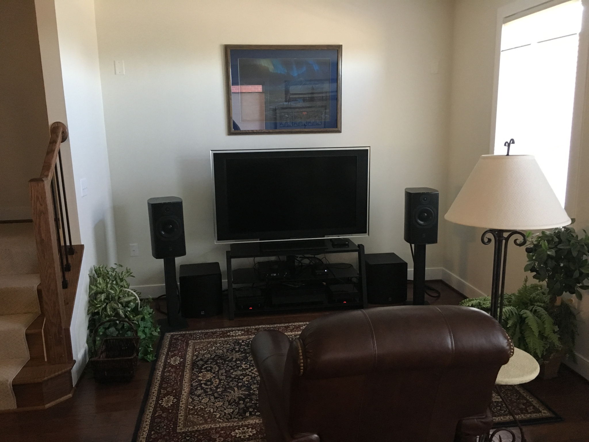 Townhouse listening room that opens to living room behind and kitchen/dining to the left