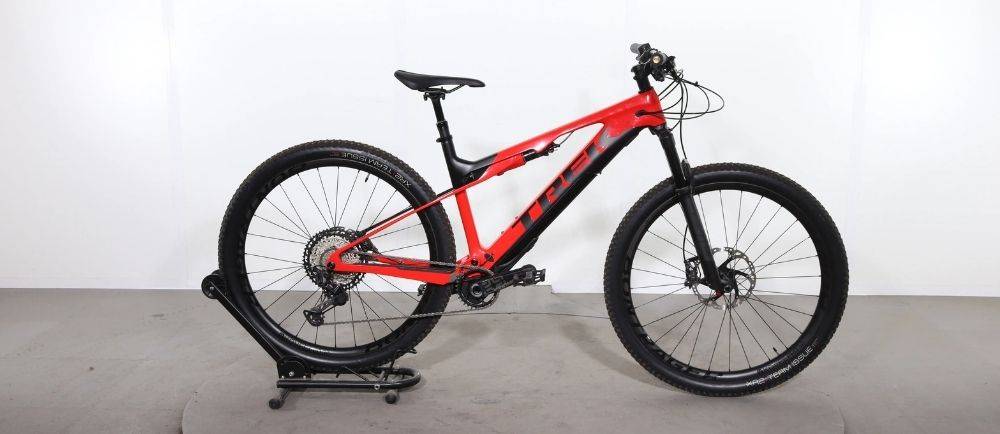 Trek E-Caliber 9.8 XT on a stand