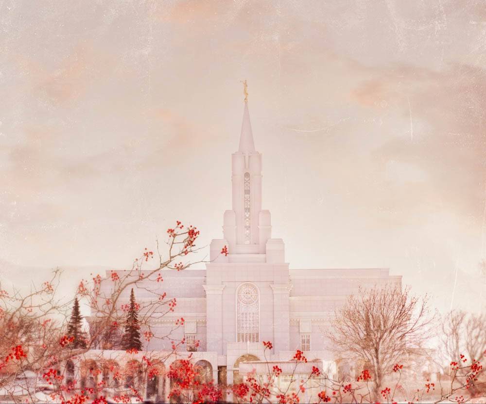 Bountiful Temple with red trees against a winter sky.