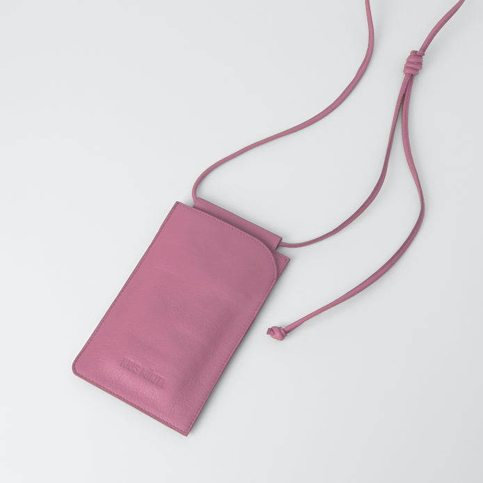 Genderless neckbags made from AppleSkin™ and vegetable tanned leather