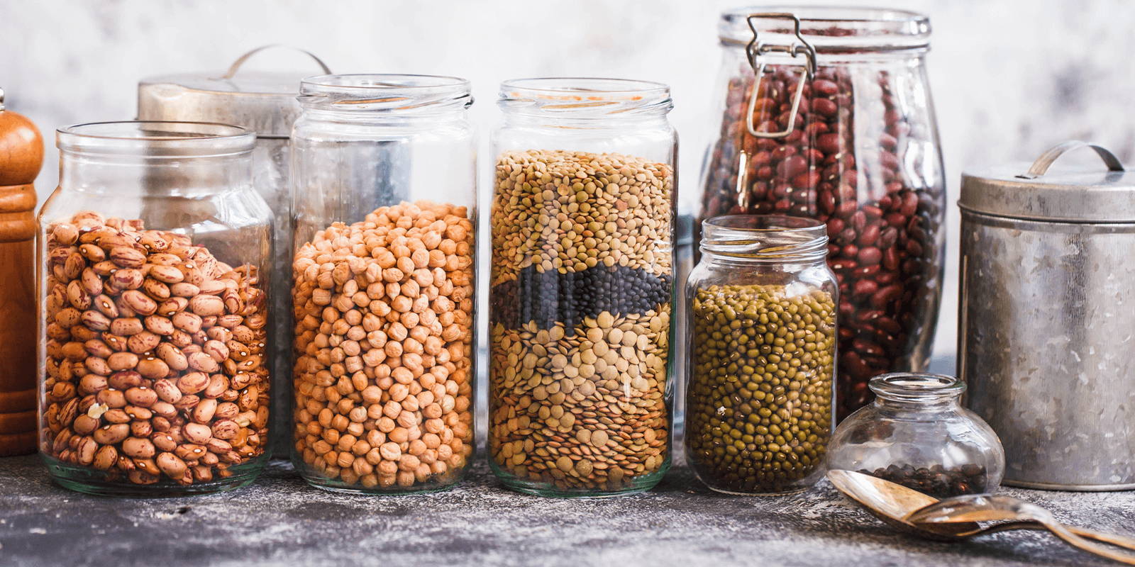 Jars filled with grains and beans.