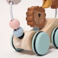 Close up on a Montessori Roaring Roller wooden pulling toy for children.