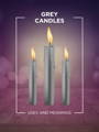 grey candles candle magiic 101 meaning icon with three lit candles and a purple and pink bokeh background
