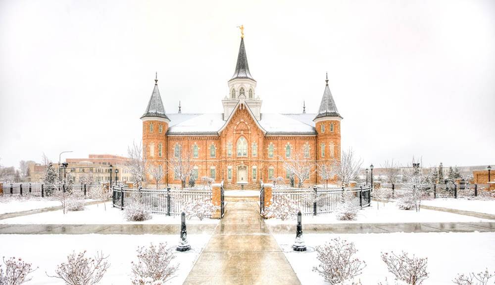 Provo City Center Temple surrounded by recent snowfall.