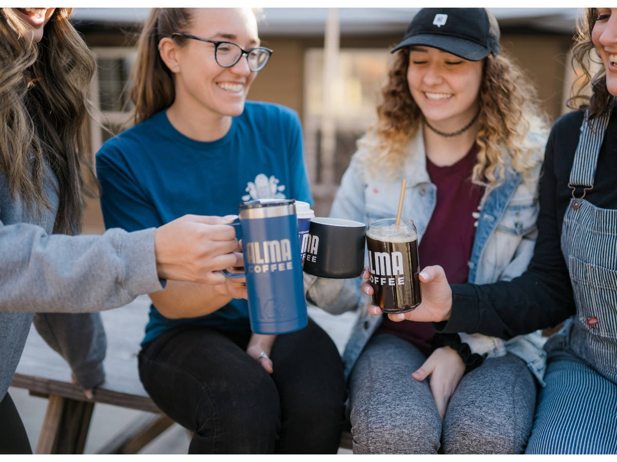 Happy women drinking coffee