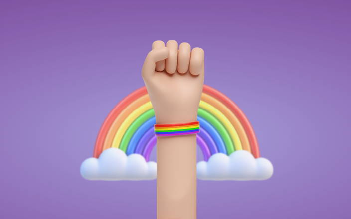 A raised fist in front of a big rainbow for Confetti's Virtual Allyship Workplace