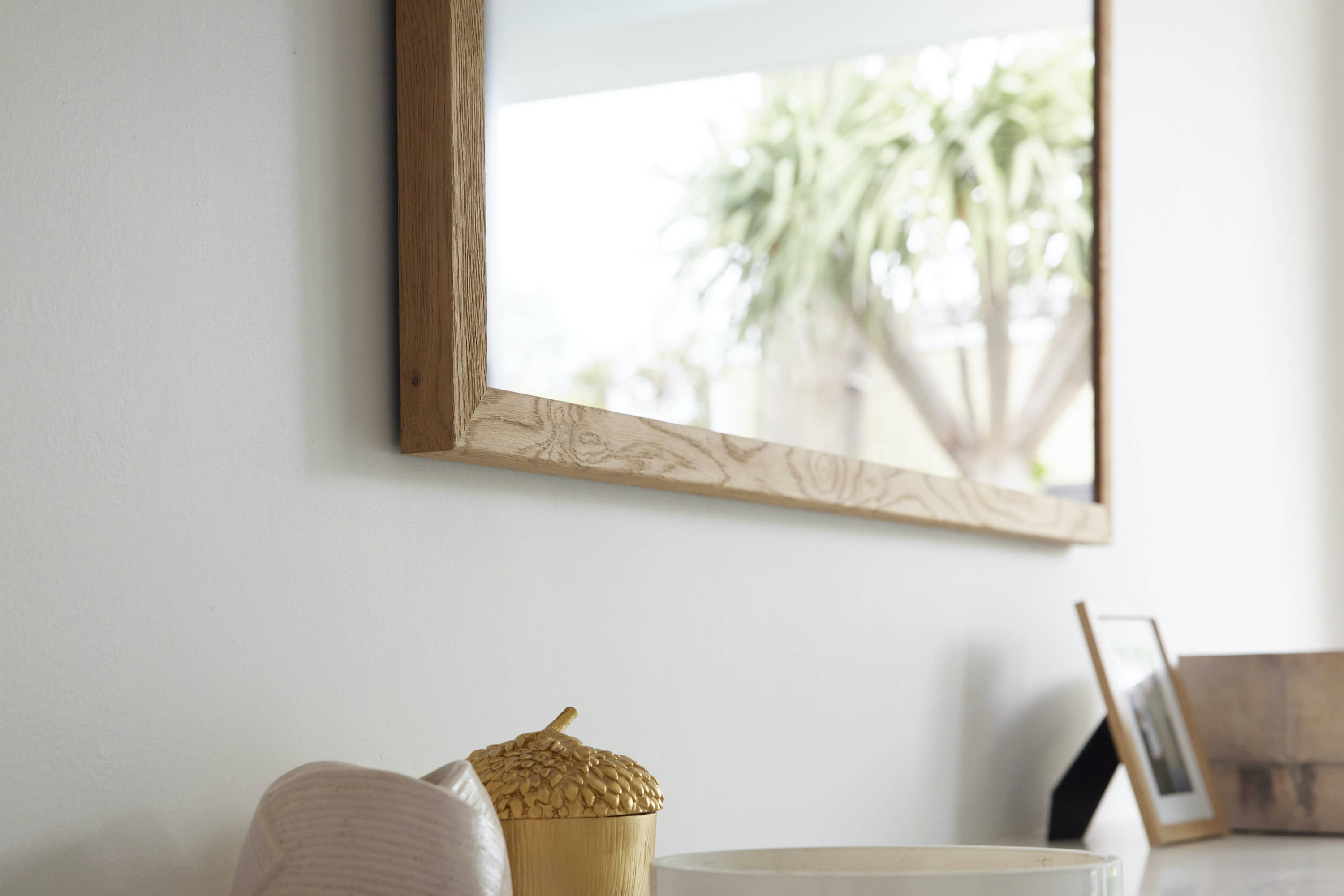 TV-Mirror Modern Rustic Oak Frame by FRAMING TO A T - A TV-Mirror with an oak frame in a light, fresh bedroom.