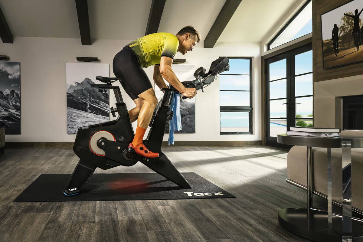 man workout on upright bike man workout on upright bike