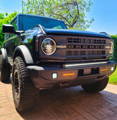 black ford bronco standard bumper with one 40in light bar on top of bumper and fog lights