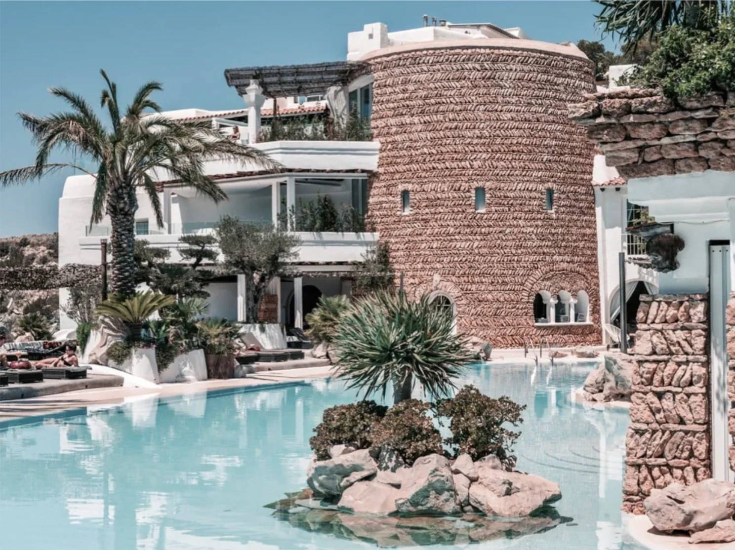 Hacienda Na Xamena by Stuart Cantor - A photograph of a villa with a pool.