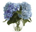 blue hydrangea silk arrangement in glass vase