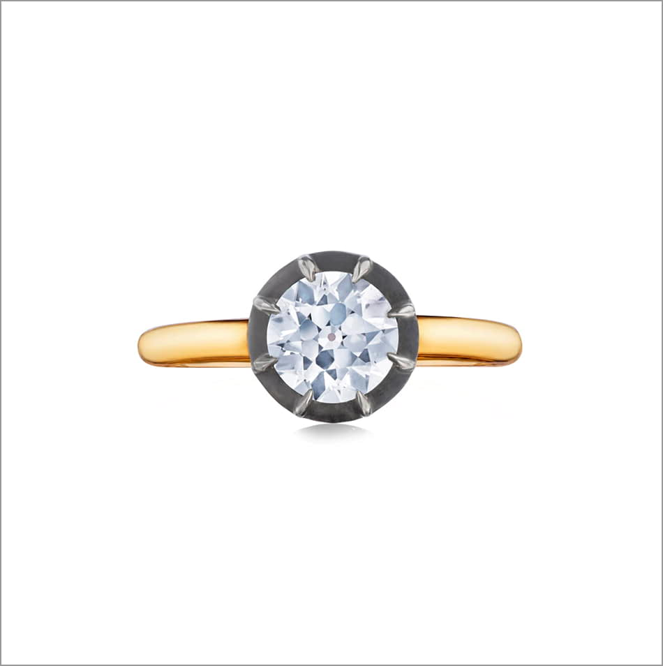 Front view of a Fred Leighton Round diamond ring on a yellow gold band. 