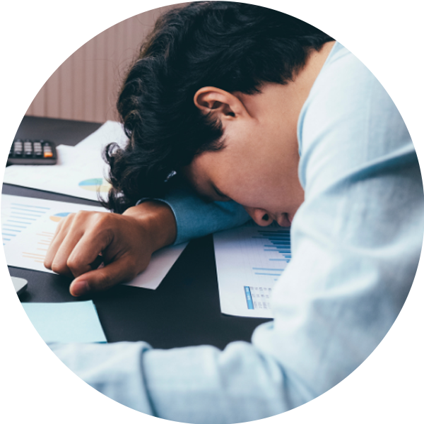 Exhausted man at desk