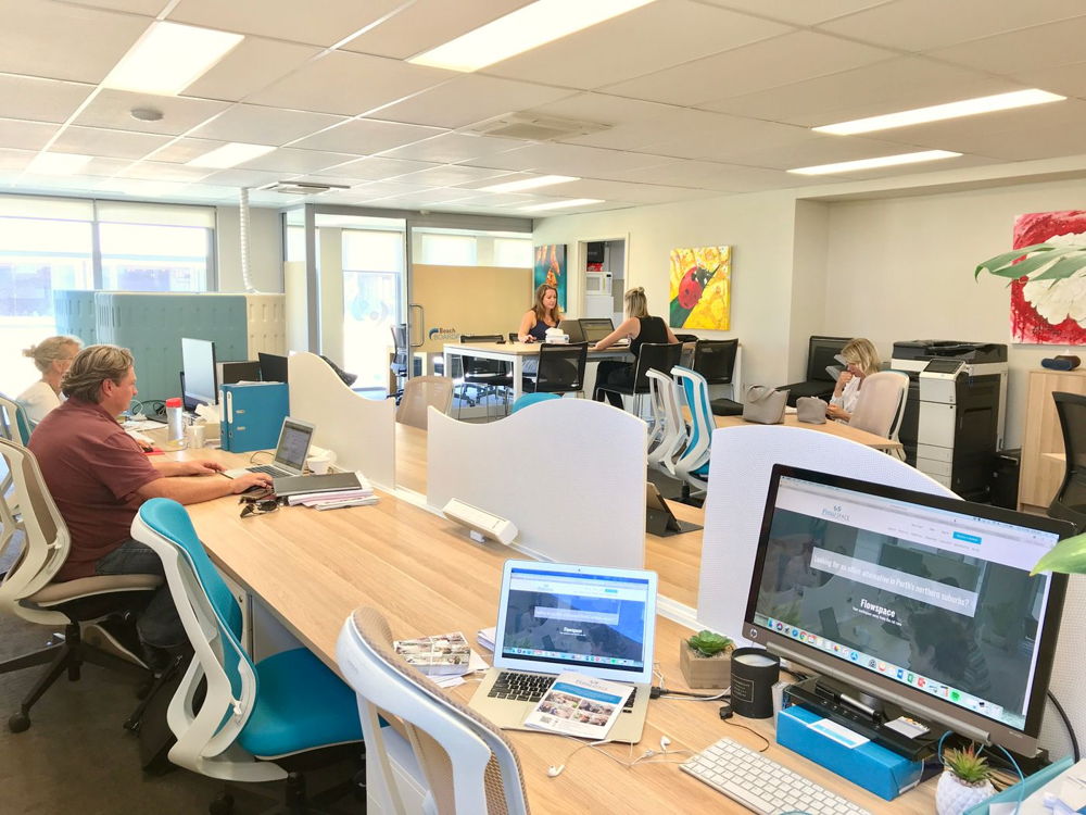 Co-working space in North Beach - a mix of hotdesks & resident desks.