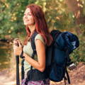 young female hiker traversing tough terrain young_female_hiker_traversing_tough_terrain