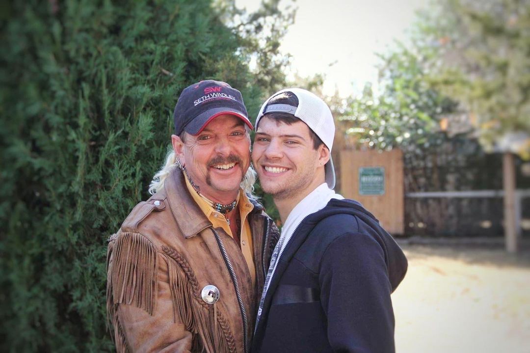 Joe Exotic with Dillon his latest husband, smiling.